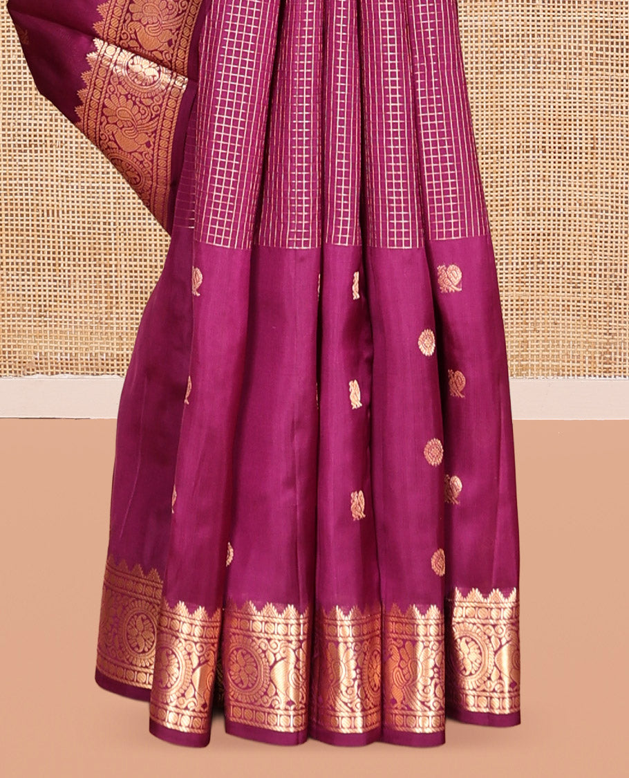 Purple Vasundhara Lite Silk Mix Saree, Artfully Detailed with Mayil-Chakram Buttas and Zari Checks All Over Its Body, Highlighted by a Zari Border of Thazampoo Rekkum, Paisa, Mayil, and Chakram Designs, a Grand Pallu, and Paired with a Matching Blouse