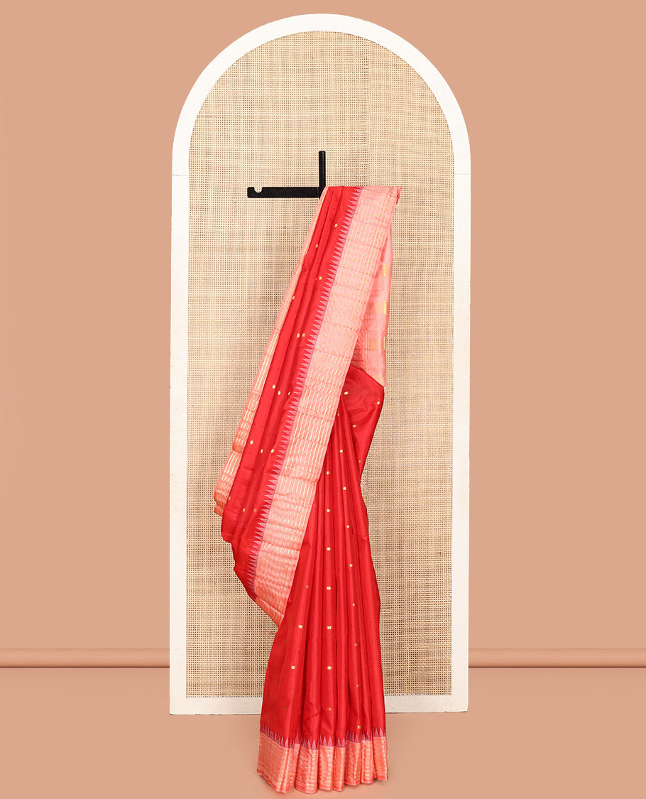 Red Vasundhara Silk Saree, Gracefully Woven with Kamalam Buttas on Its Body, Complemented by a Captivating Contrast Thazampoo Rekku Border of Banaras Designs, Zari-Decked Up Pallu, and Paired with a Contrast Blouse