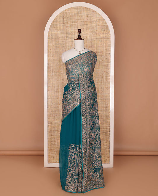 Teal blue floral and paisley vine embroidered designer saree, scallop paisley thread embroidered border