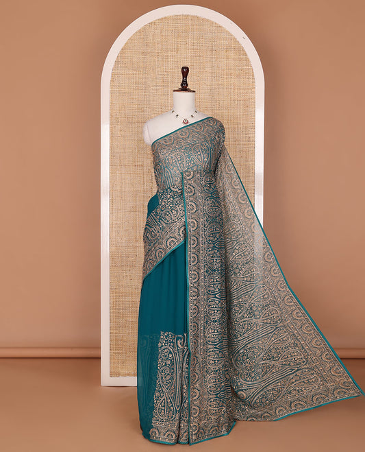 Teal blue floral and paisley vine embroidered designer saree, scallop paisley thread embroidered border