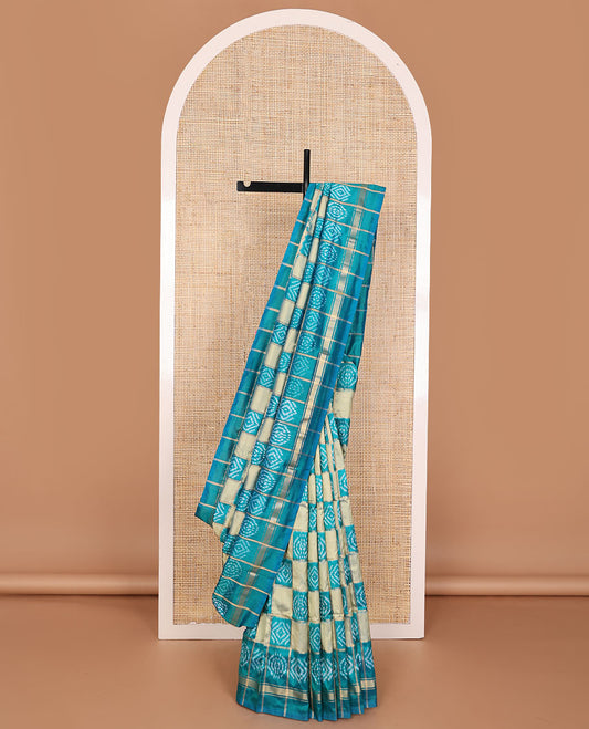 Blue buttas enclosed checked ikkat saree, self-border & pallu of buttas enclosed checks
