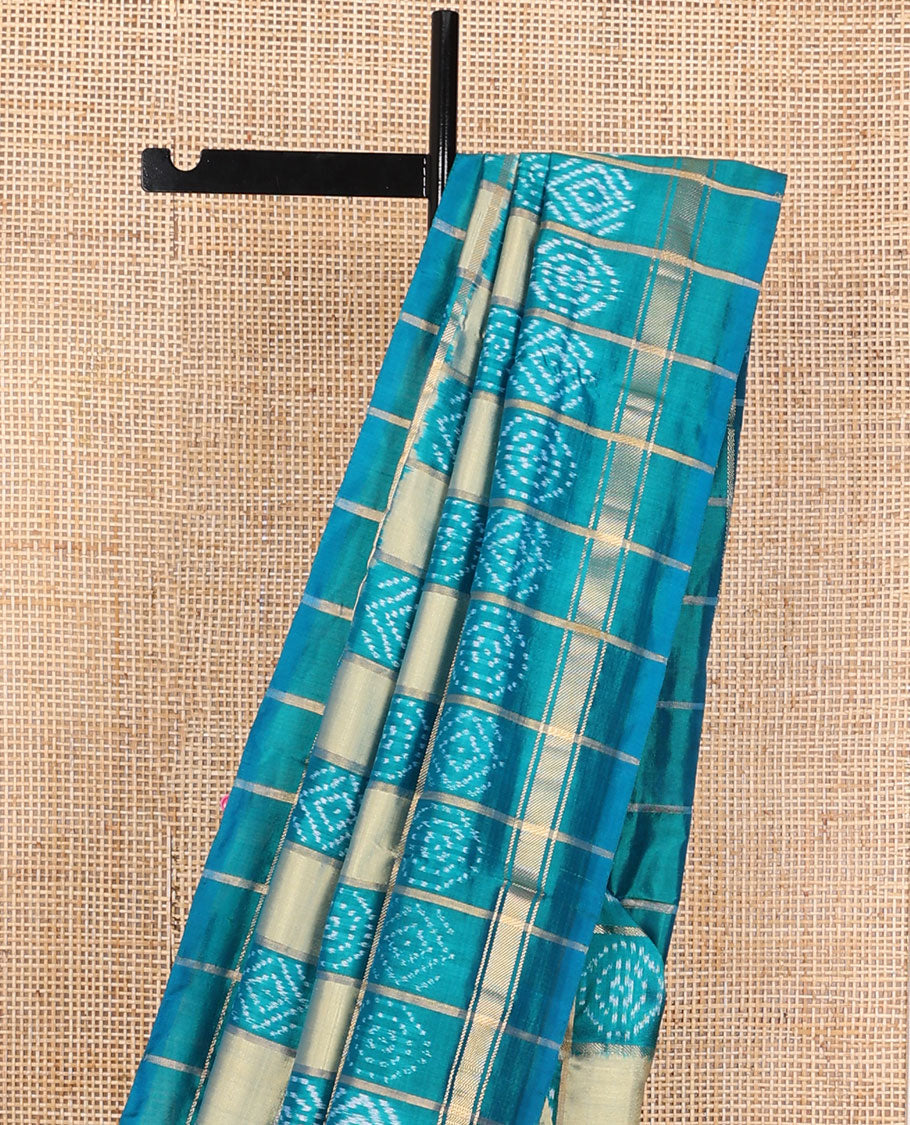 Blue buttas enclosed checked ikkat saree, self-border & pallu of buttas enclosed checks