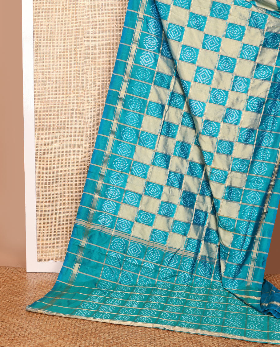 Blue buttas enclosed checked ikkat saree, self-border & pallu of buttas enclosed checks