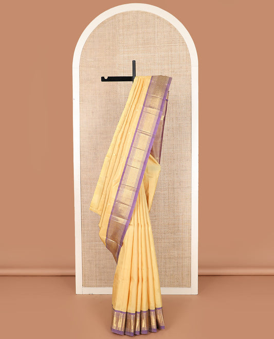 Sandal zari buttas Kanchipuram silk saree, contrast one-sided border of paneer sombu, banaras, muthu and then kuli kann designs, and pallu of zari designs