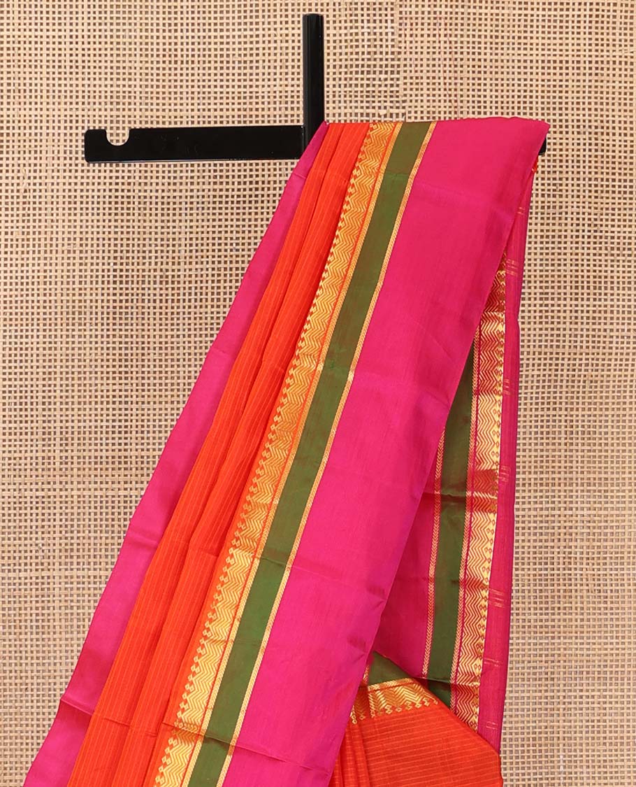 Orange striped Kanchipuram silk saree, contrast kaal erangina rettai pettu border of diamond, vanki, and kathir designs, and zari design pallu