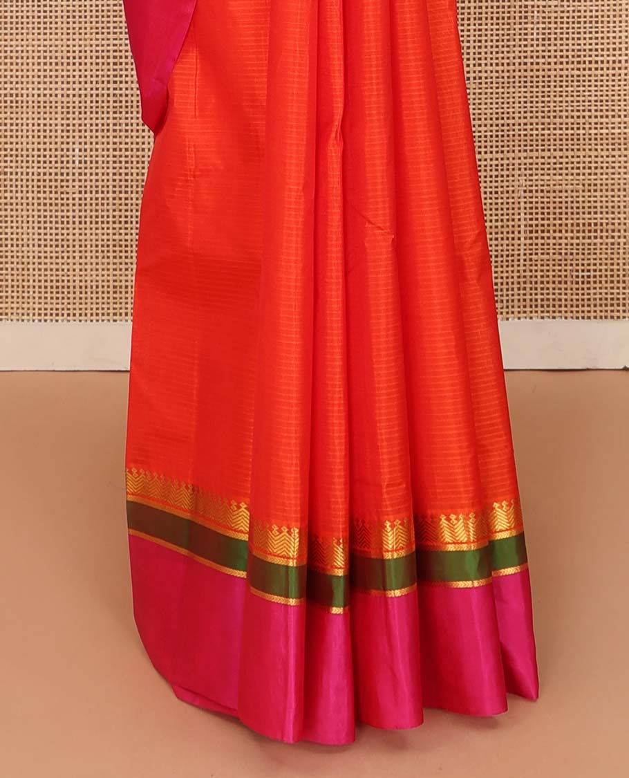 Orange striped Kanchipuram silk saree, contrast kaal erangina rettai pettu border of diamond, vanki, and kathir designs, and zari design pallu
