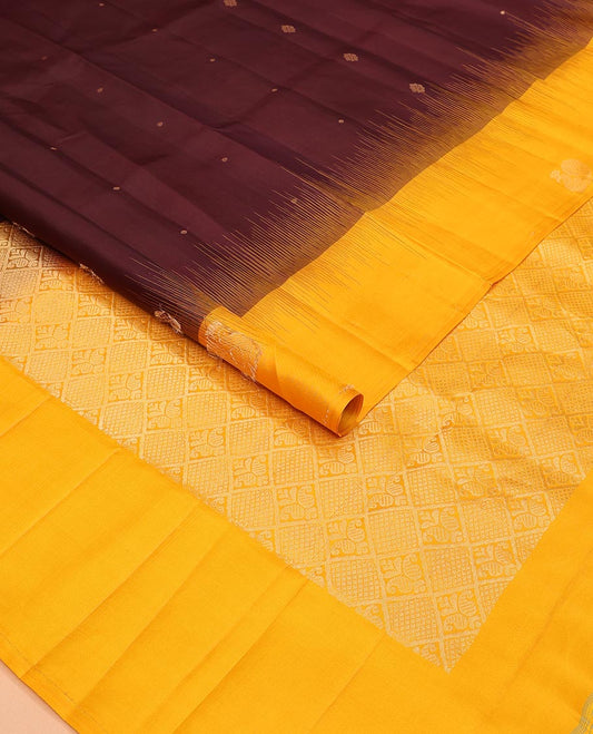 Maroon Mayuri Soft Silk Saree Richly Detailed with Zari Buttas Across Its Body, Highlighted by Contrast Border of Mayil Designs, Pallu Adorned with Mayil Kann and Manga Enclosed Jaal Design, and Paired with a Contrast Blouse