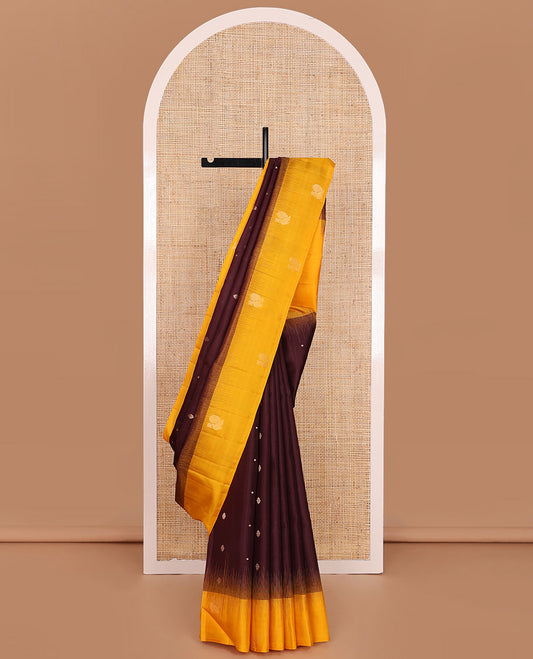 Maroon Mayuri Soft Silk Saree Richly Detailed with Zari Buttas Across Its Body, Highlighted by Contrast Border of Mayil Designs, Pallu Adorned with Mayil Kann and Manga Enclosed Jaal Design, and Paired with a Contrast Blouse