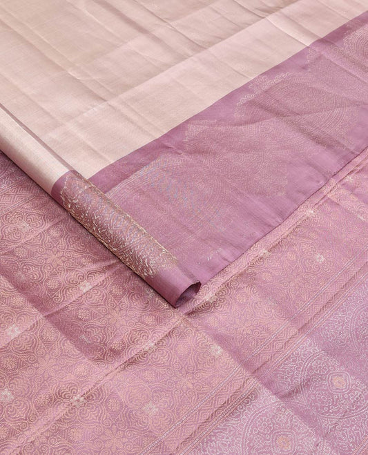 Grey buttas soft silk saree, contrast zari woven border, and pallu of intricate designs