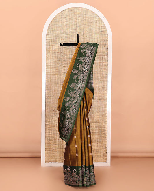 Green zari buttas soft silk saree, contrast floral and bird motifs border, and pallu of jaal, floral, and bird designs