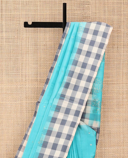 Blue Mayuri Soft Silk Saree, Steeped in Richness with Buttas and Floral Designs on Its Body, Complemented by Contrast Checked Border, Checked Pallu, and Paired with a Contrast Checked Blouse