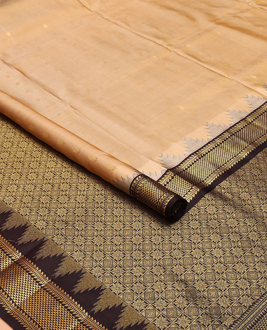 Sandal nine-yard silksaree with zari buttas,contrast thazampoo reku border of ara bogudi,muthu & ara maadam & jaal pallu