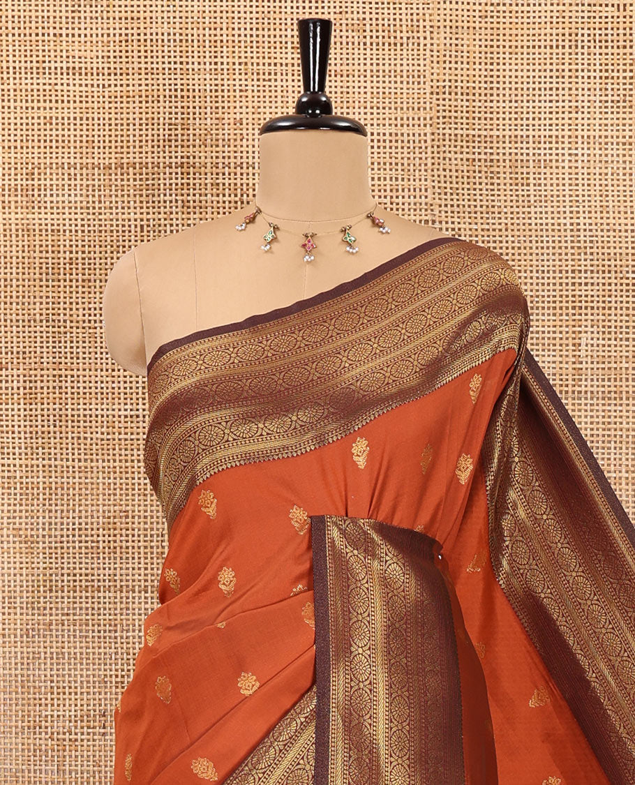 Orange zari buttas kanchi soft silk saree, contrast traditional zari design border, zari design pallu, and a contrast jacquard blouse