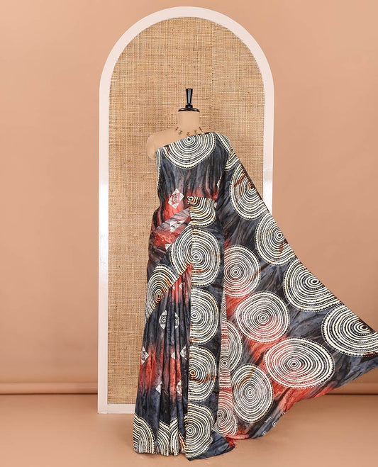 Borderless blue-maroon marble texture printed with batik block printed satin crepe saree, printed pallu, and a matching blouse of spiral motifs