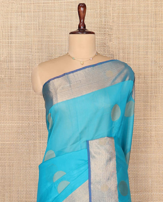 Blue Silk Cotton Saree, Subtly Sparkled with Polka Dot Buttas, Complemented by a Contrast Border, Intricately Designed Pallu, and a Contrast Blouse