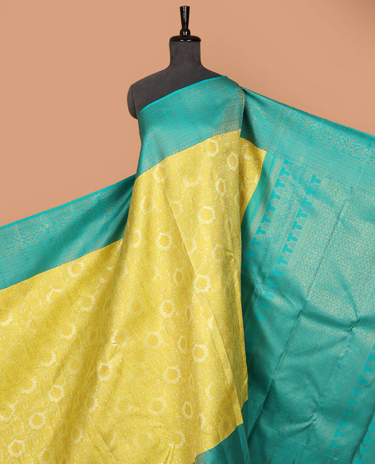 Yellow jacquard silk saree, contrast geometric patterned zari border & argyle patterned pallu