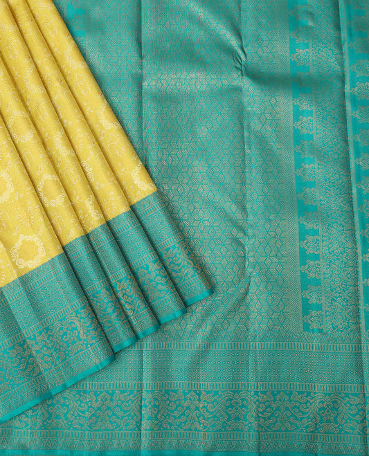 Yellow jacquard silk saree, contrast geometric patterned zari border & argyle patterned pallu