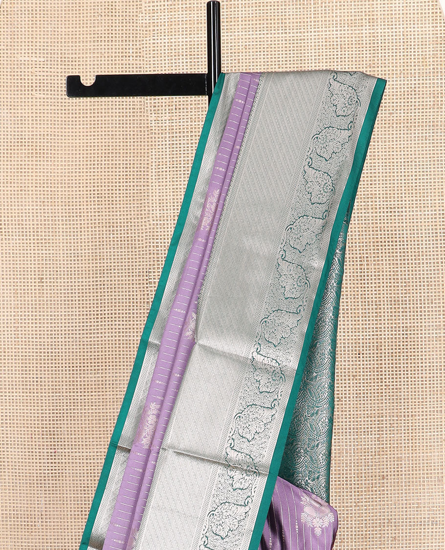 Purple striped and buttas soft silk saree, contrast traditional zari design border, and intricate floral design pallu