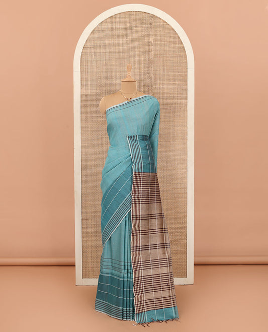 Blue heathered tussar silk saree, contrast striped border, and contrast striped pallu