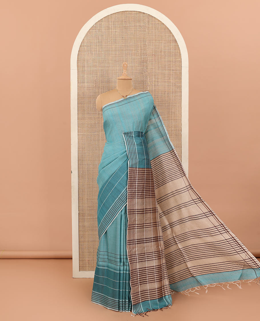Blue heathered tussar silk saree, contrast striped border, and contrast striped pallu