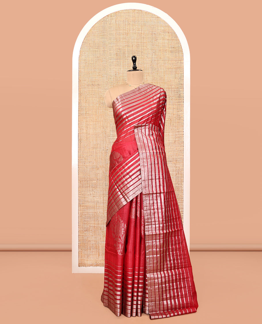 Borderless Red Tussar Silk Saree, Gracefully Embellished with Zari Stripes and Floral Buttas, Striped Pallu, and a Matching Blouse