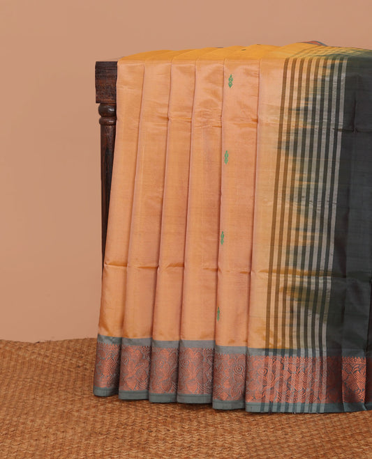 Yellow banana pith saree with thread woven buttas, contrast floral design zari border, and pallu of stripes, and buttas