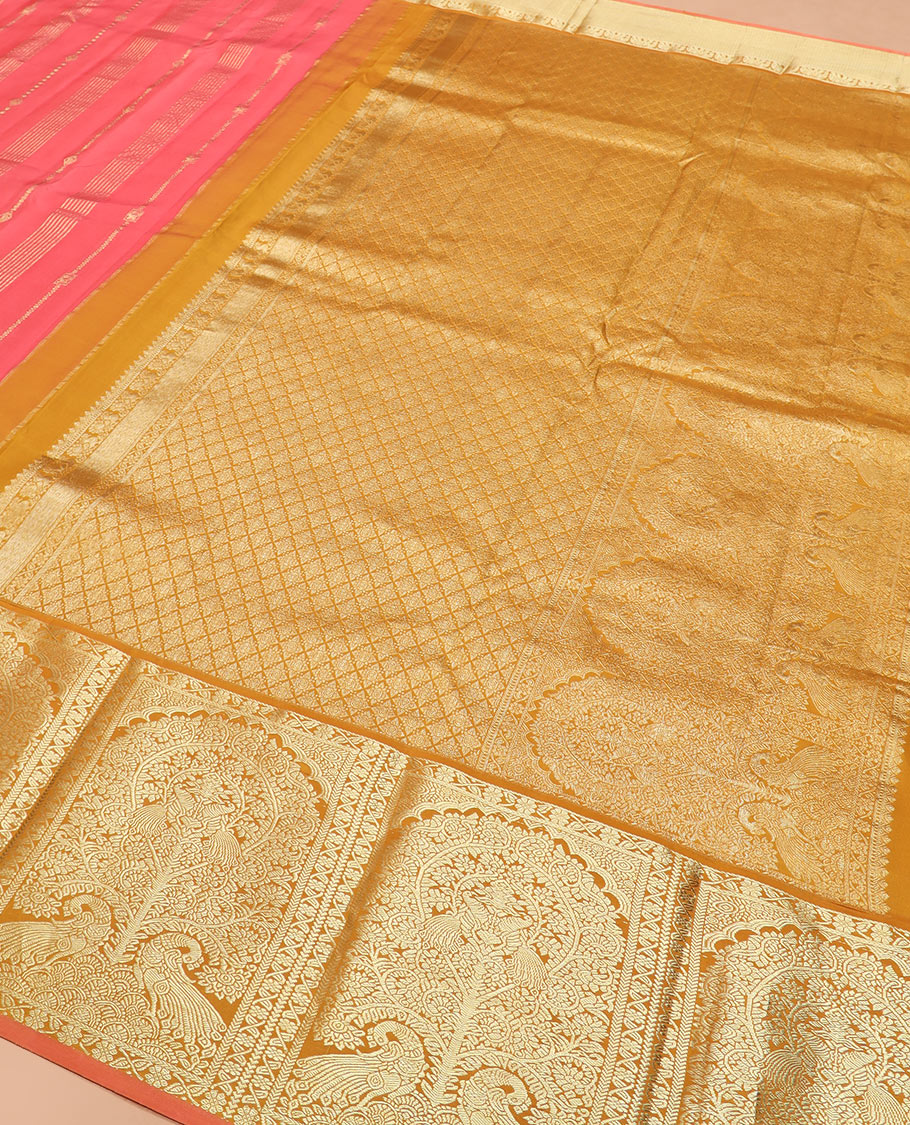 Pink zari design silk saree, contrast tree of life-style motifs woven border of peacocks, and zari-rich jaal pallu