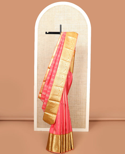 Pink zari design silk saree, contrast tree of life-style motifs woven border of peacocks, and zari-rich jaal pallu