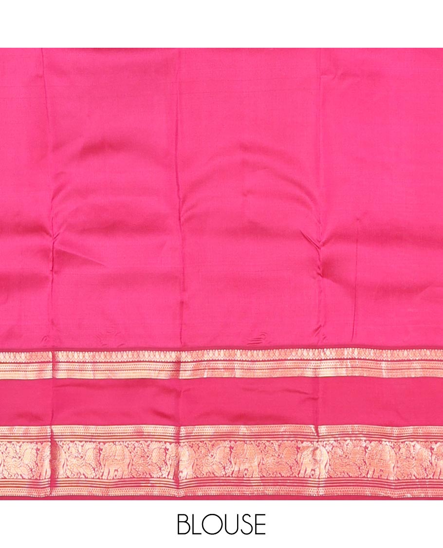 Green kamalam meena buttas silksaree, contrast rettai pettu border of thilakam,neli,mayil kann & puli nagam & intricate pallu