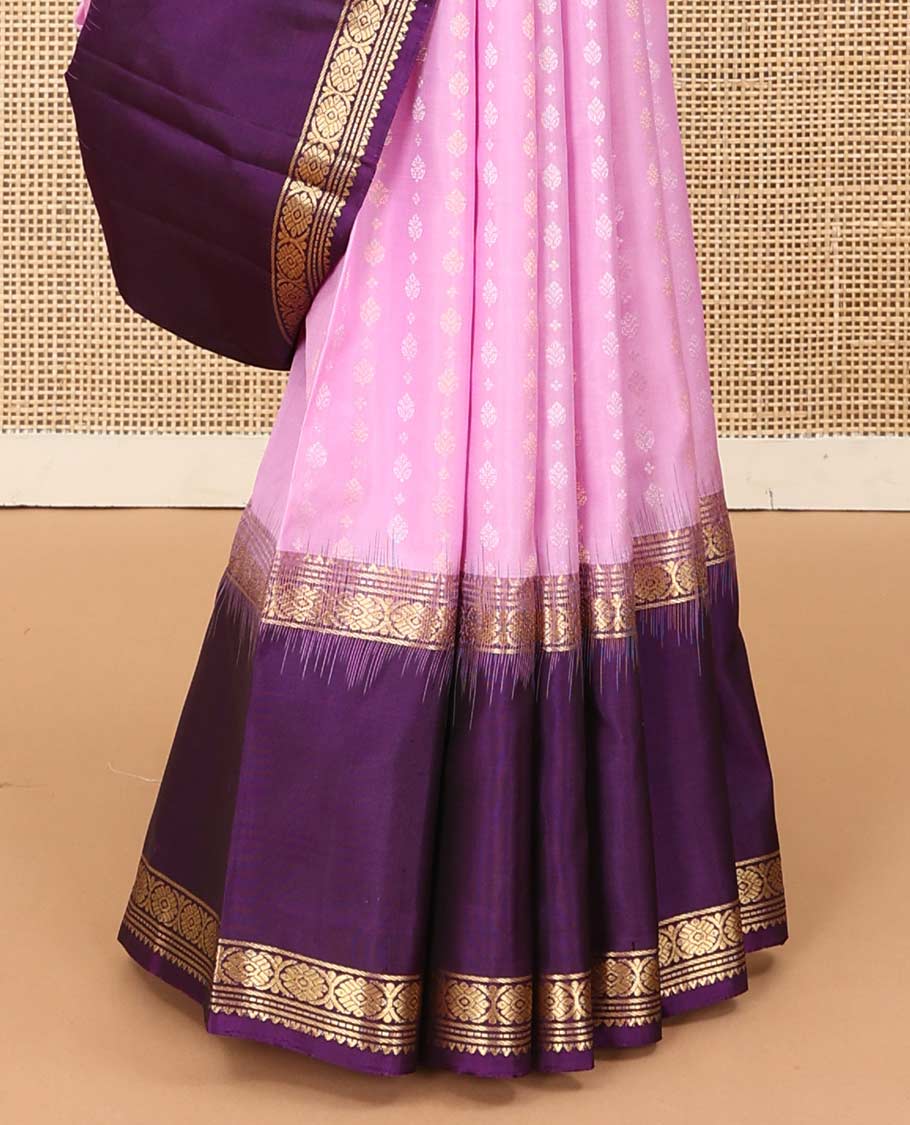 Pink buttas Kanchipuram silk saree, contrast border of rekku, banaras, muthu, and laddu kamalam, and jaal pallu