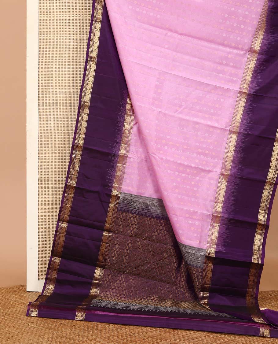 Pink buttas Kanchipuram silk saree, contrast border of rekku, banaras, muthu, and laddu kamalam, and jaal pallu