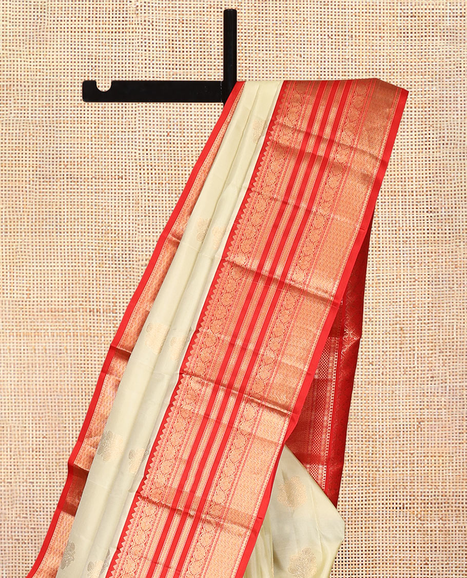 Pale Green Vasundhara Silk Saree,Sparsely Woven with Zari Buttas, Contrast Border of Thilakam Mokku, Kodi Visiry, Muthu, Mayil Kann, Mayil, and Kodi Visiry, Grand Pallu, and Contrast Blouse
