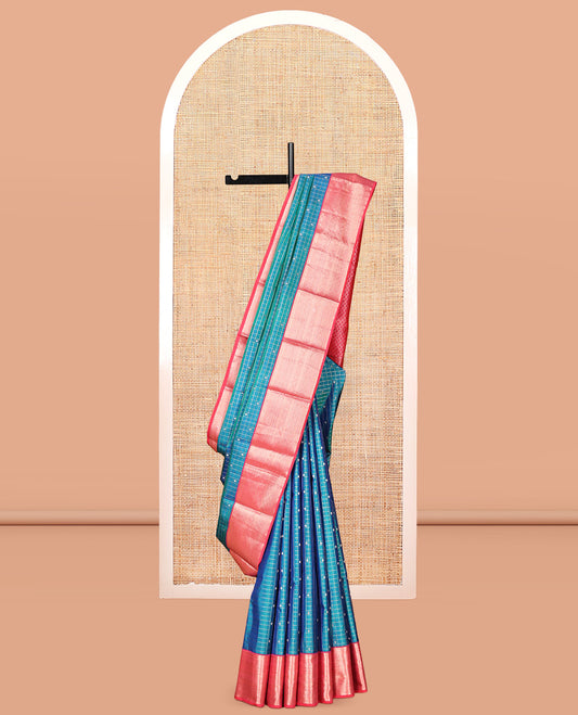 Blue Vasundhara Silk Saree, Featuring Zari Butta Enclosed Checks, a Contrast Border of Thilakam Mokku, Muthu, Mayil Kann, Rettai Neli, and Vanki Designs, Jaal Pallu, and Contrast Blouse