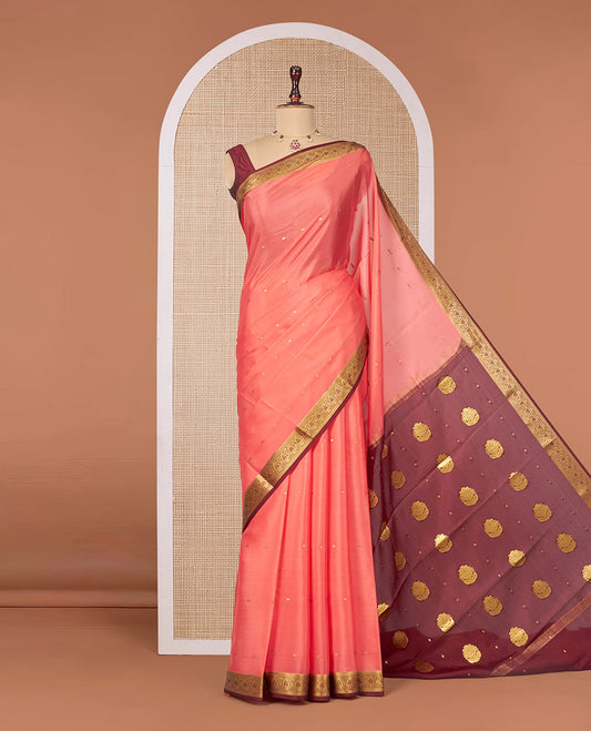 Peach Mysore Silk Saree, Embellished with Zari Buttas All Over Its Body, Complemented by a Contrast Traditional Zari Design Border, Zari-Buttas Woven Pallu, and Paired with a Contrast Blouse