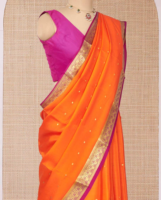 Orange Mysore Silk Saree, Finely Crafted with Zari Buttas All Over Its Body, Complemented by a Contrast Traditional Zari Design Border, Zari-Buttas Woven Pallu, and Paired with a Contrast Blouse