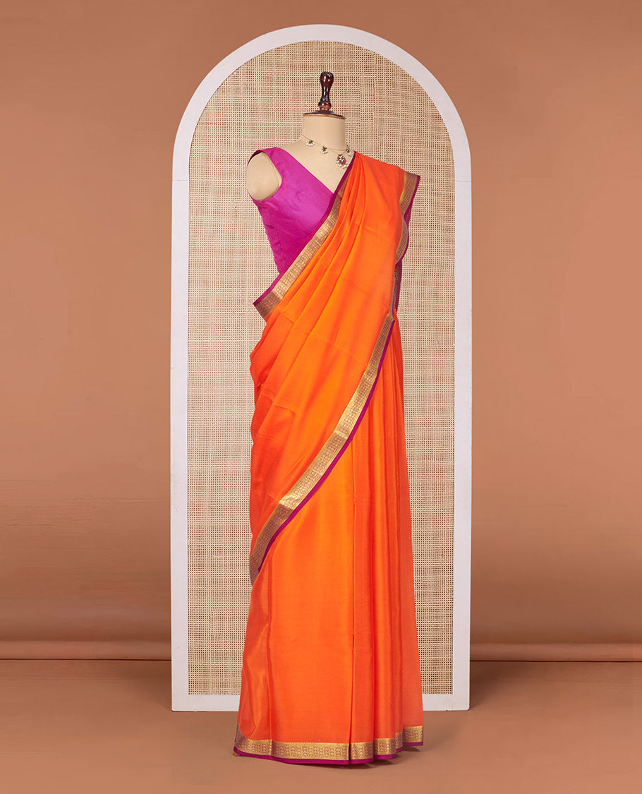 Orange Plain Mysore Silk Saree, Complemented by a Contrast Traditional Zari Design Border, Zari Striped Pallu, and Paired with a Contrast Blouse