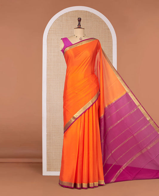 Orange Plain Mysore Silk Saree, Complemented by a Contrast Traditional Zari Design Border, Zari Striped Pallu, and Paired with a Contrast Blouse