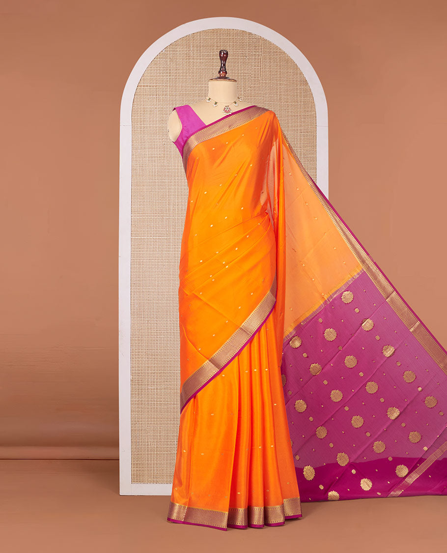 Orange Mysore Silk Saree, Prettified with Zari Buttas All Over Its Body, Complemented by a Contrast Traditional Zari Design Border, Zari-Buttas Woven Pallu, and Paired with a Contrast Blouse
