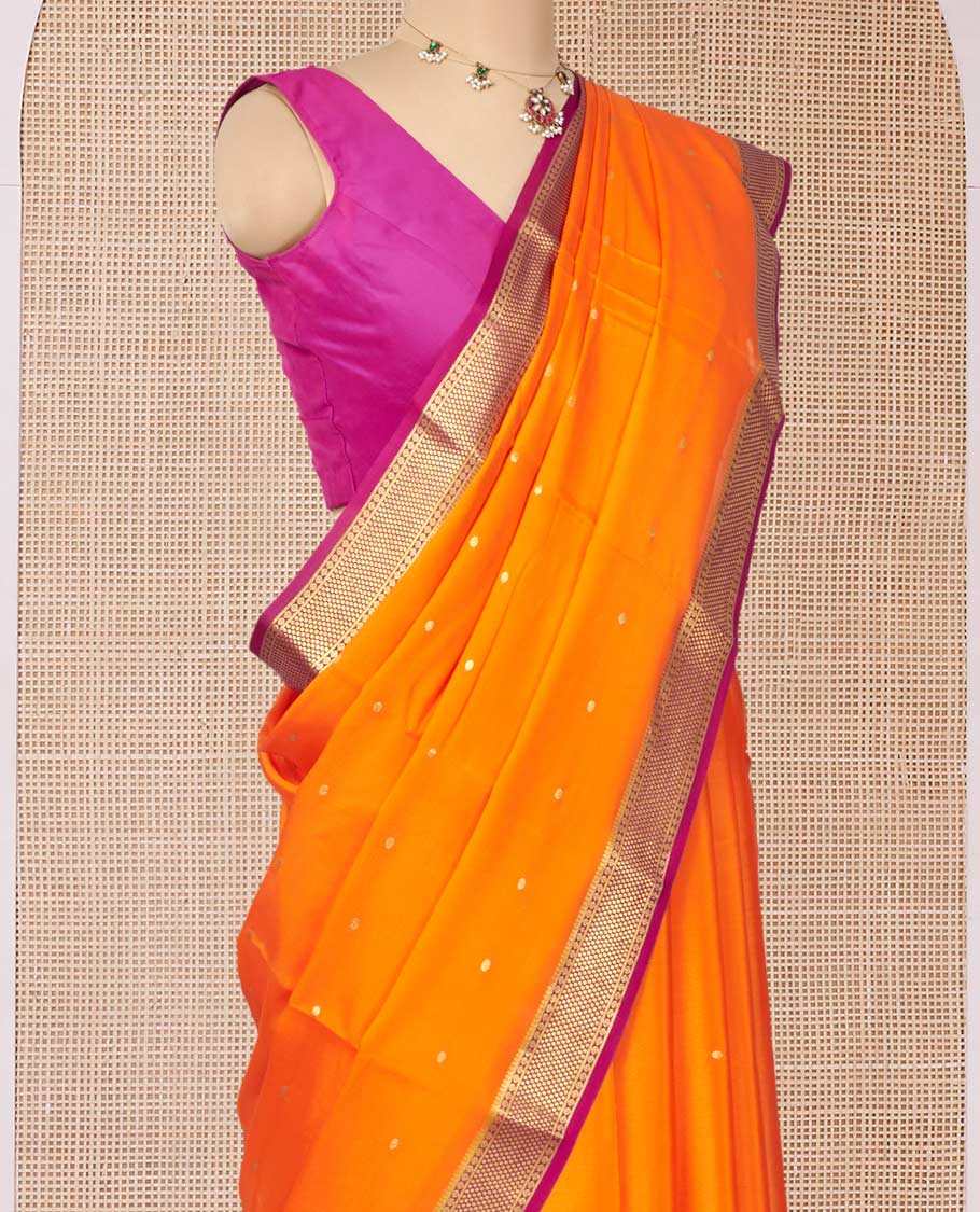 Orange Mysore Silk Saree, Prettified with Zari Buttas All Over Its Body, Complemented by a Contrast Traditional Zari Design Border, Zari-Buttas Woven Pallu, and Paired with a Contrast Blouse