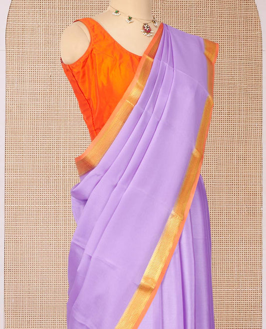 Lavender Plain Mysore Silk Saree, Complemented by a Contrast Traditional Zari Design Border, Zari Striped Pallu, and Paired with a Contrast Blouse