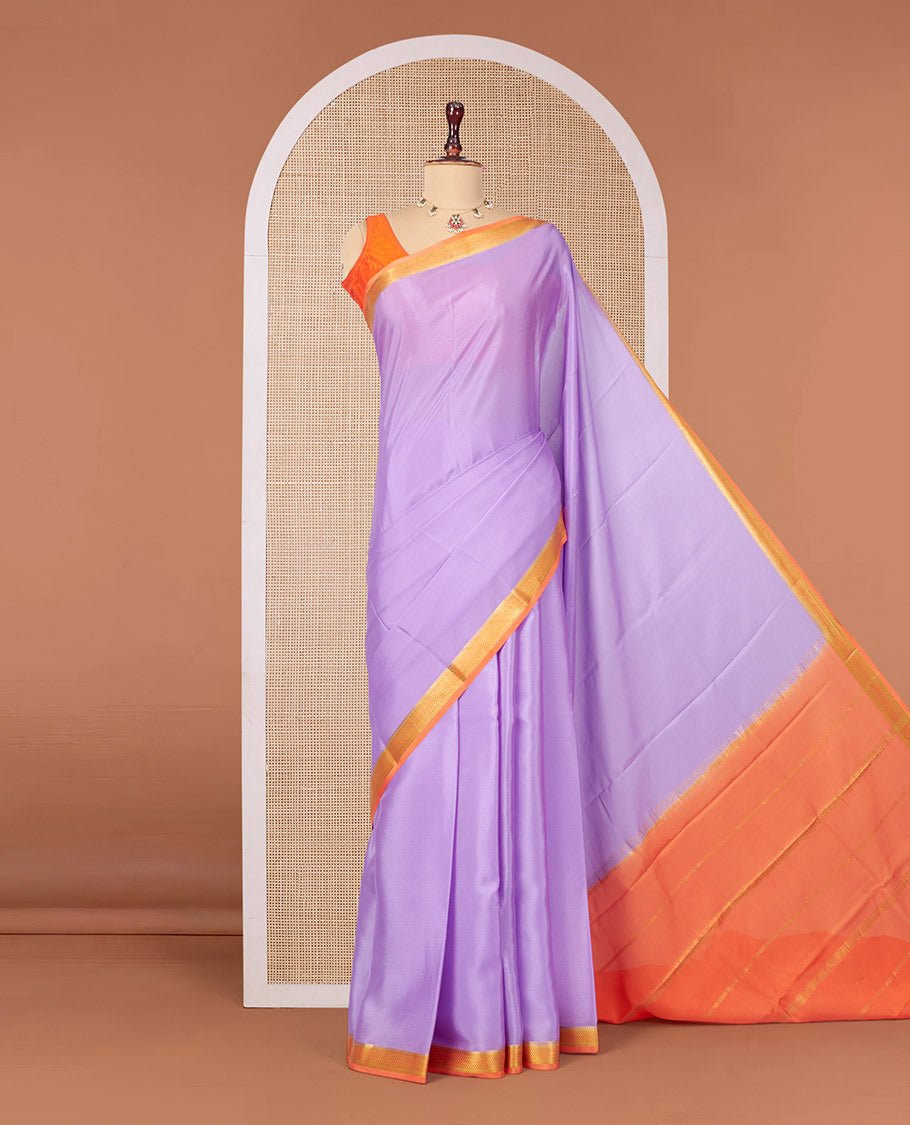 Lavender Plain Mysore Silk Saree, Complemented by a Contrast Traditional Zari Design Border, Zari Striped Pallu, and Paired with a Contrast Blouse