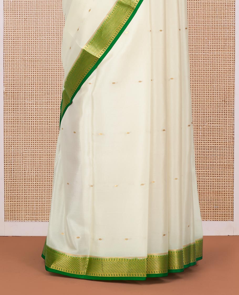 White Mysore Silk Saree, Ornamented with Zari Buttas All Over Its Body, Complemented by a Contrast Traditional Zari Design Border, Zari-Buttas Woven Pallu, and Paired with a Contrast Blouse