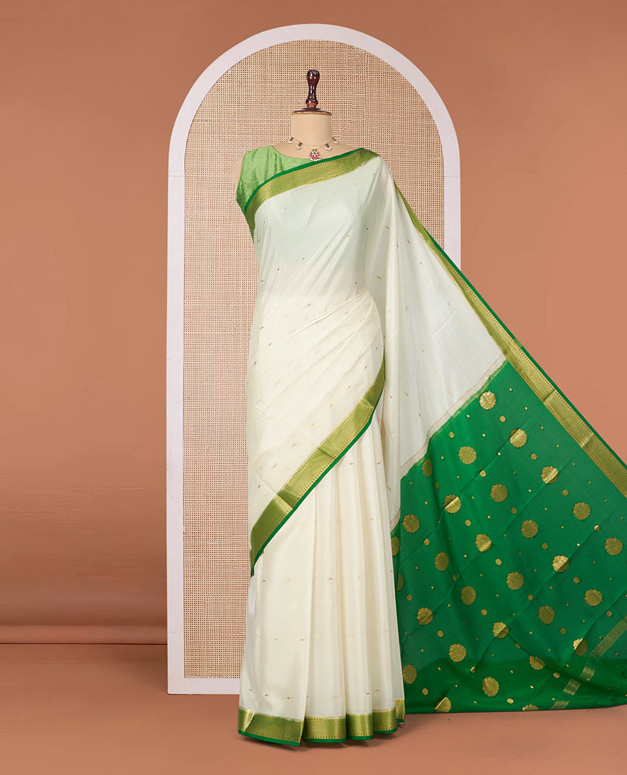 White Mysore Silk Saree, Ornamented with Zari Buttas All Over Its Body, Complemented by a Contrast Traditional Zari Design Border, Zari-Buttas Woven Pallu, and Paired with a Contrast Blouse