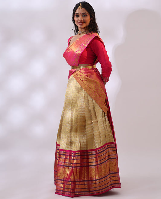 Gold striped silk half saree with contrast intricate zari design, floral embroidery blouse & floral zari design dhavani