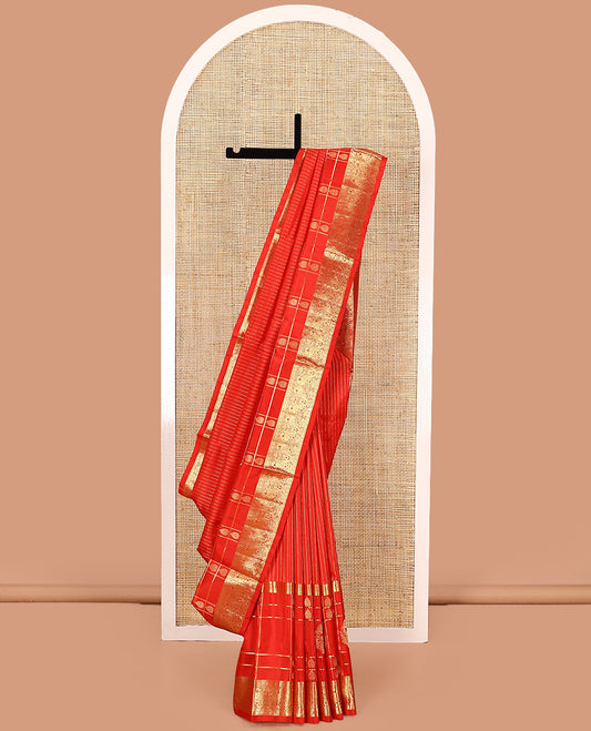 Red striped Venkatagiri silk saree, traditional zari design border, and geometric patterned pallu