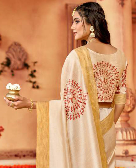 Cream designer catalog saree features warli village-theme characters, bavanji border, and warli village-themed pallu