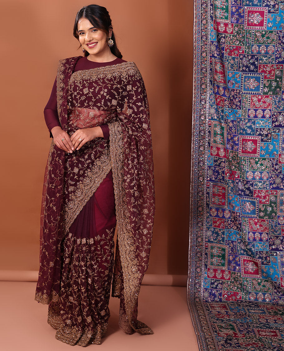Wine Net Saree, Impeccably Embroidered with Floral Jaal Design All Over Its Body, Featuring a Scallop Embroidered Border, Floral Jaal Embroidered Pallu, and a Plain Blouse