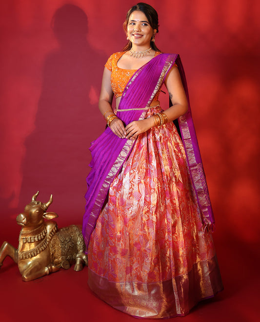Orange Art Silk Half-Saree, Adorned with a Jacquard Design Stitched Skirt, Complemented by a Contrast Traditional Zari Design Woven Border, Paired with a Blouse, and a Contrast Traditional Zari-Bordered Dhavani