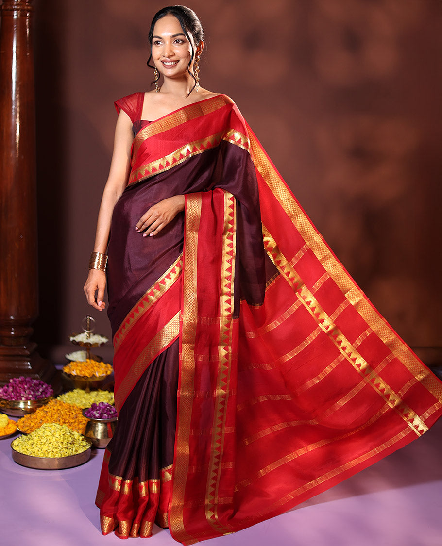 Brown Plain Silk Saree, Complemented by Captivating Contrast Rettai Pettu Border Featuring Thazampoo Rekku, and Jaal Designs, Pallu Adorned with Zari Stripes, and Paired with a Contrast Blouse