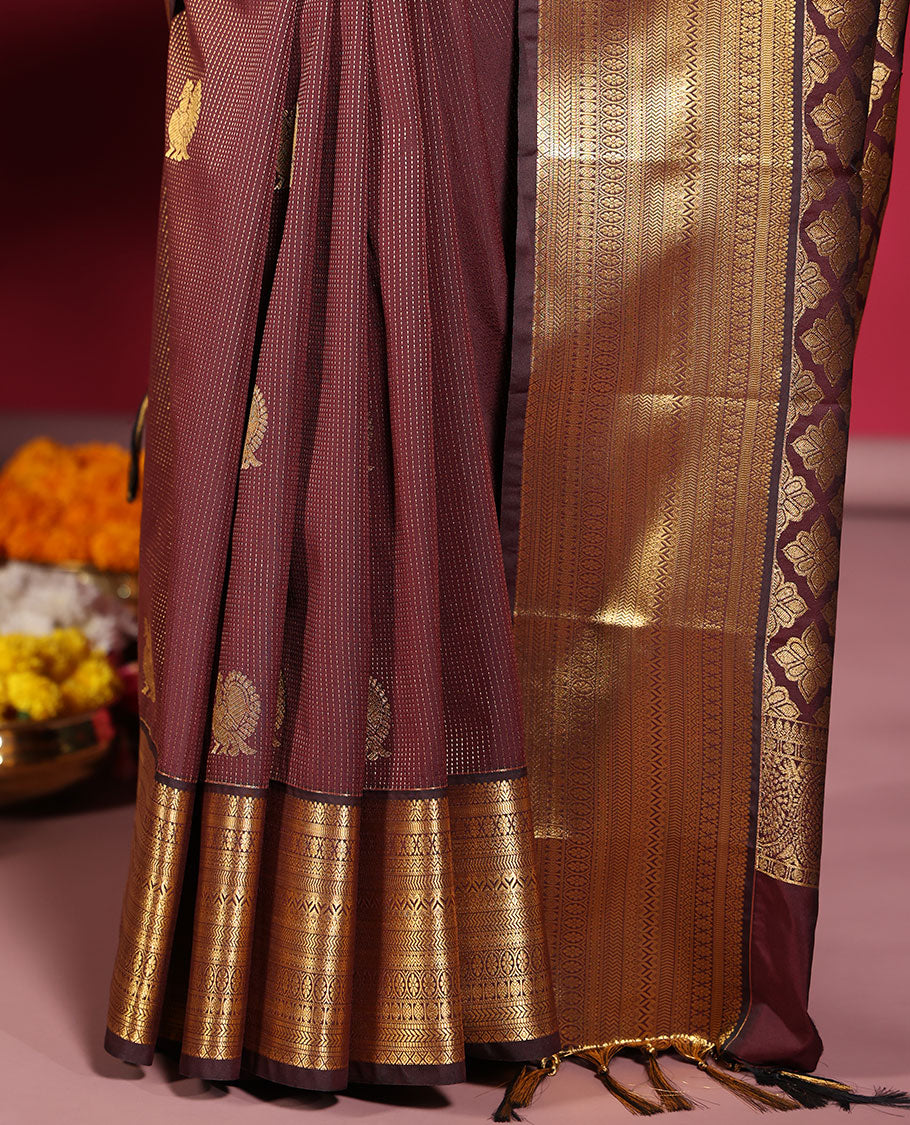 Chocolate Brown Budget Silk Saree, Elevated with Muthu Stripes, and Peacock Buttas on Its Body, Highlighted by a Traditional Zari Design Border, Pallu Delicately Woven with Floral Jaal Designs, and Paired with a Matching Blouse